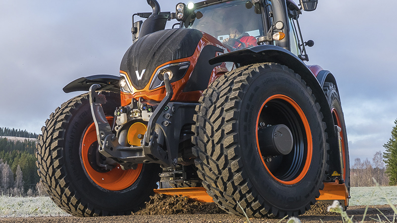 valtra unlimited custom tractor with candy orange paint